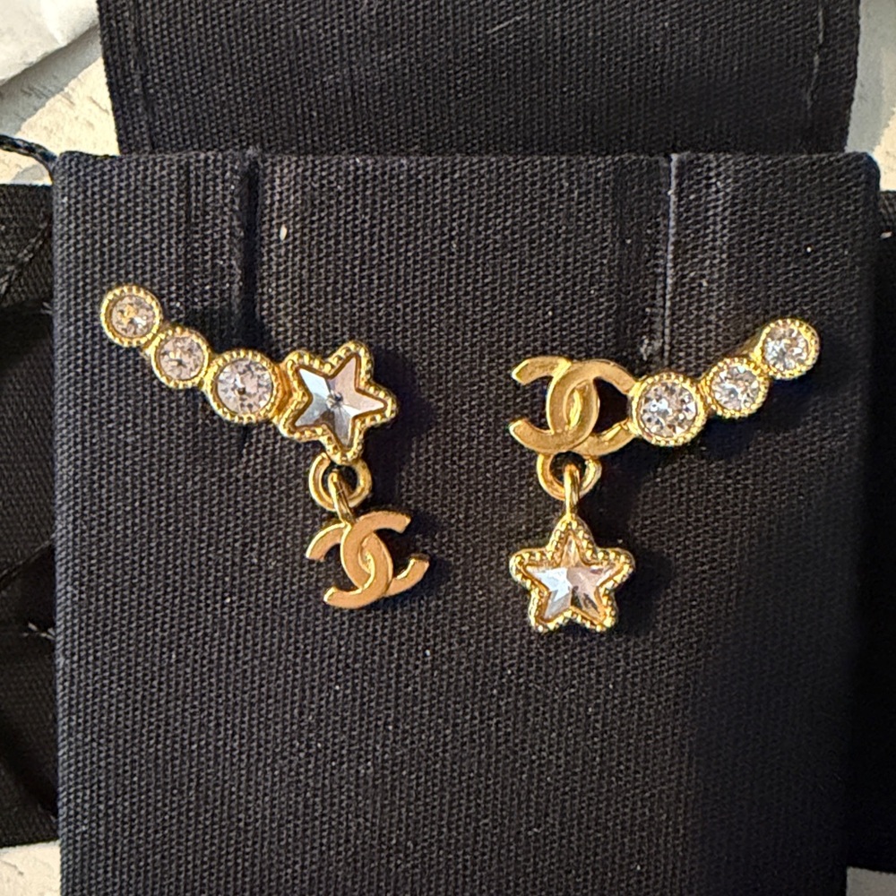 Authentic NWT CHANEL Gold and Black Logo Earrings Stars in Box